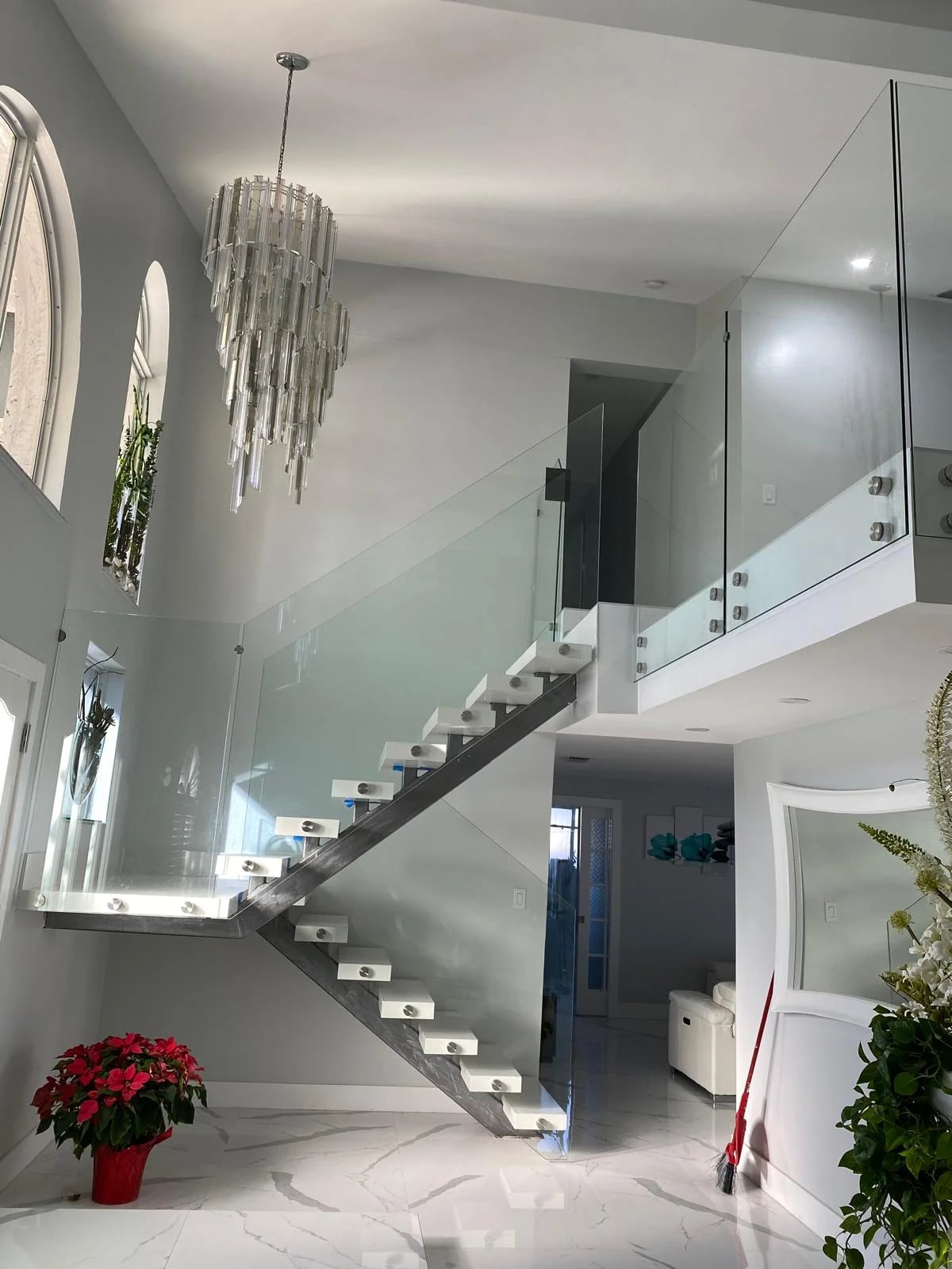Frameless glass railing for modern staircase South Florida