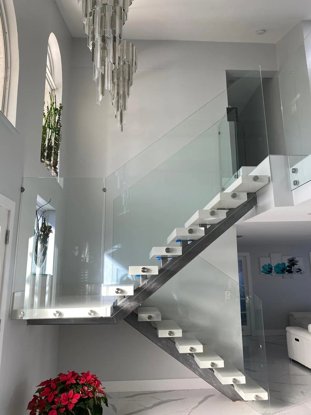 Glass staircase railing with stainless steel hardware Miami