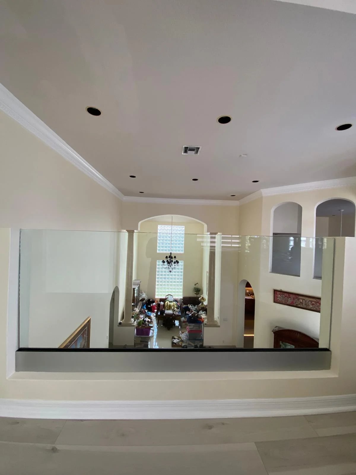 Frameless glass staircase Miami home