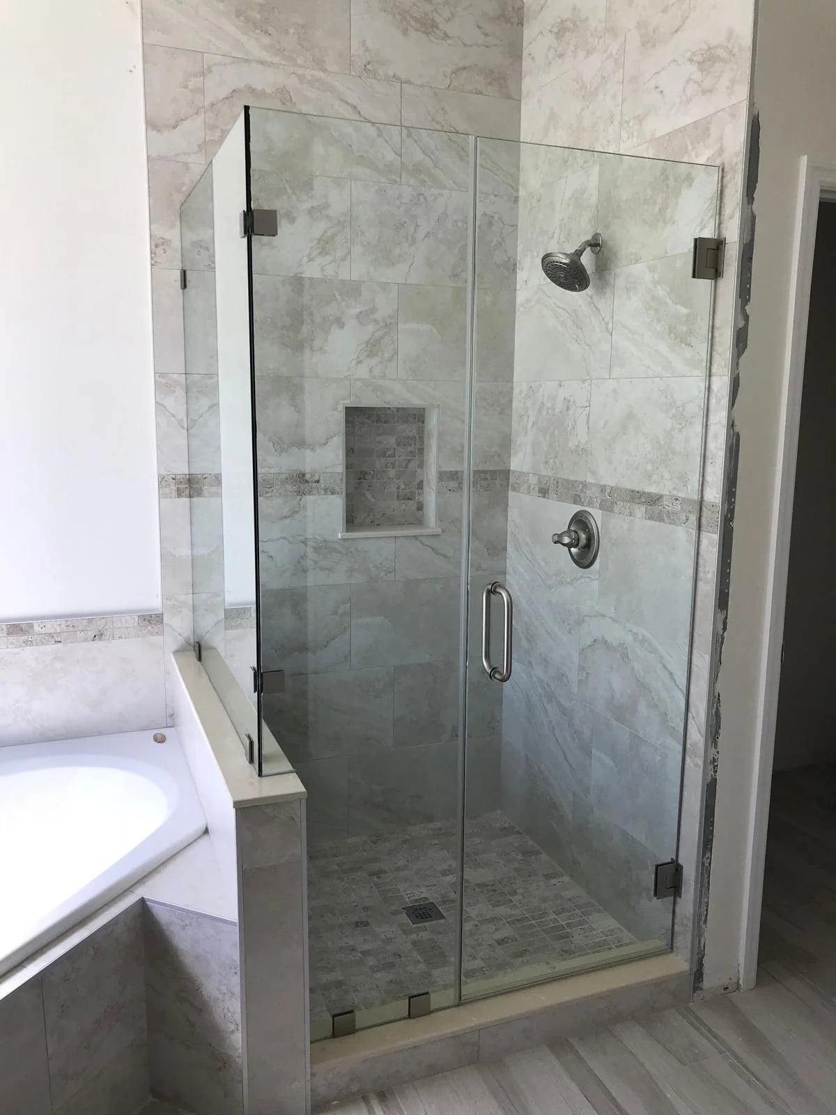 Glass shower door with chrome hardware Miami