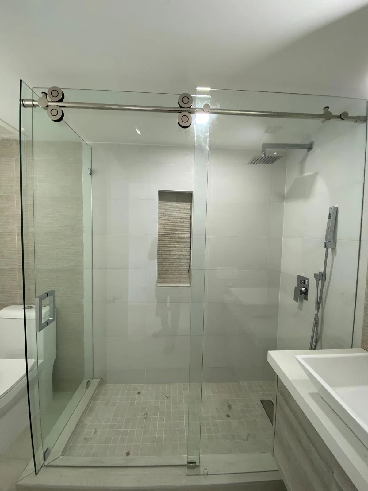 Frameless shower door with towel bar Miami